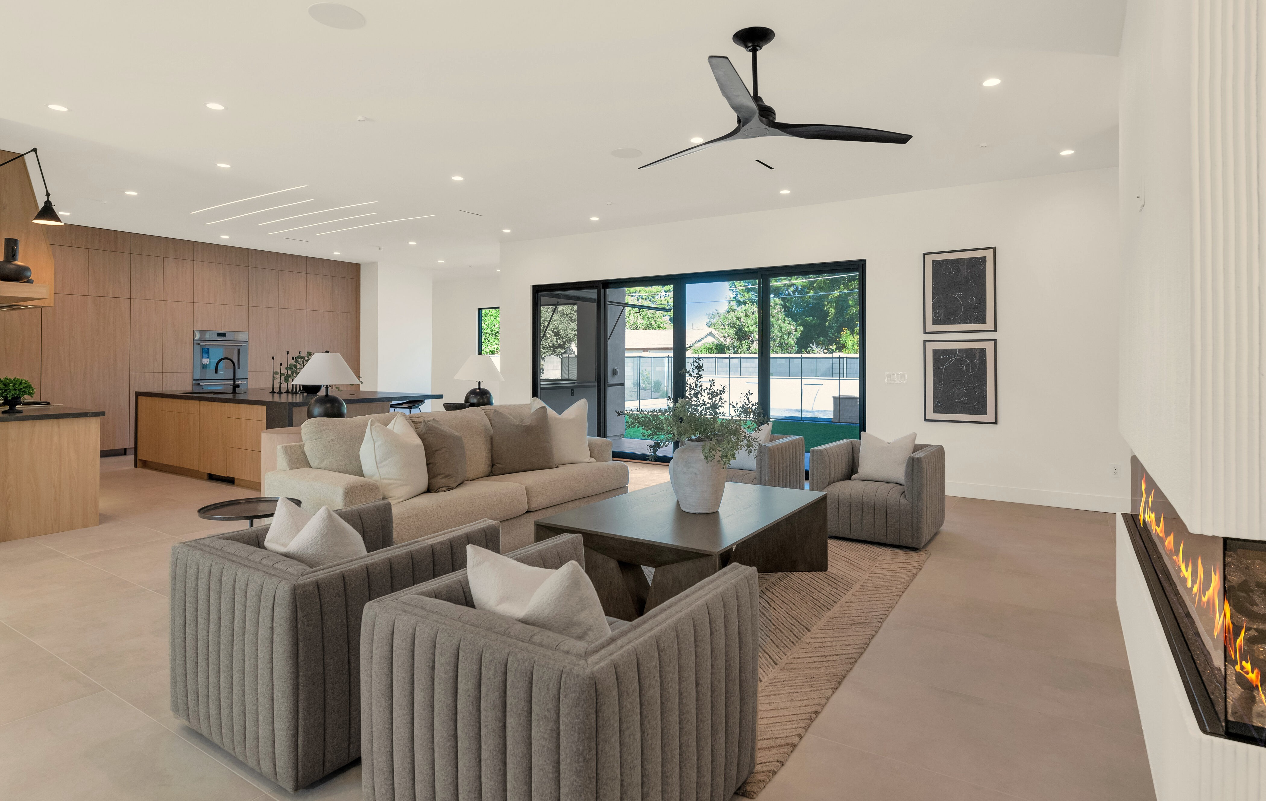 View of lavish living room in a custom home by Erwin Jaye.