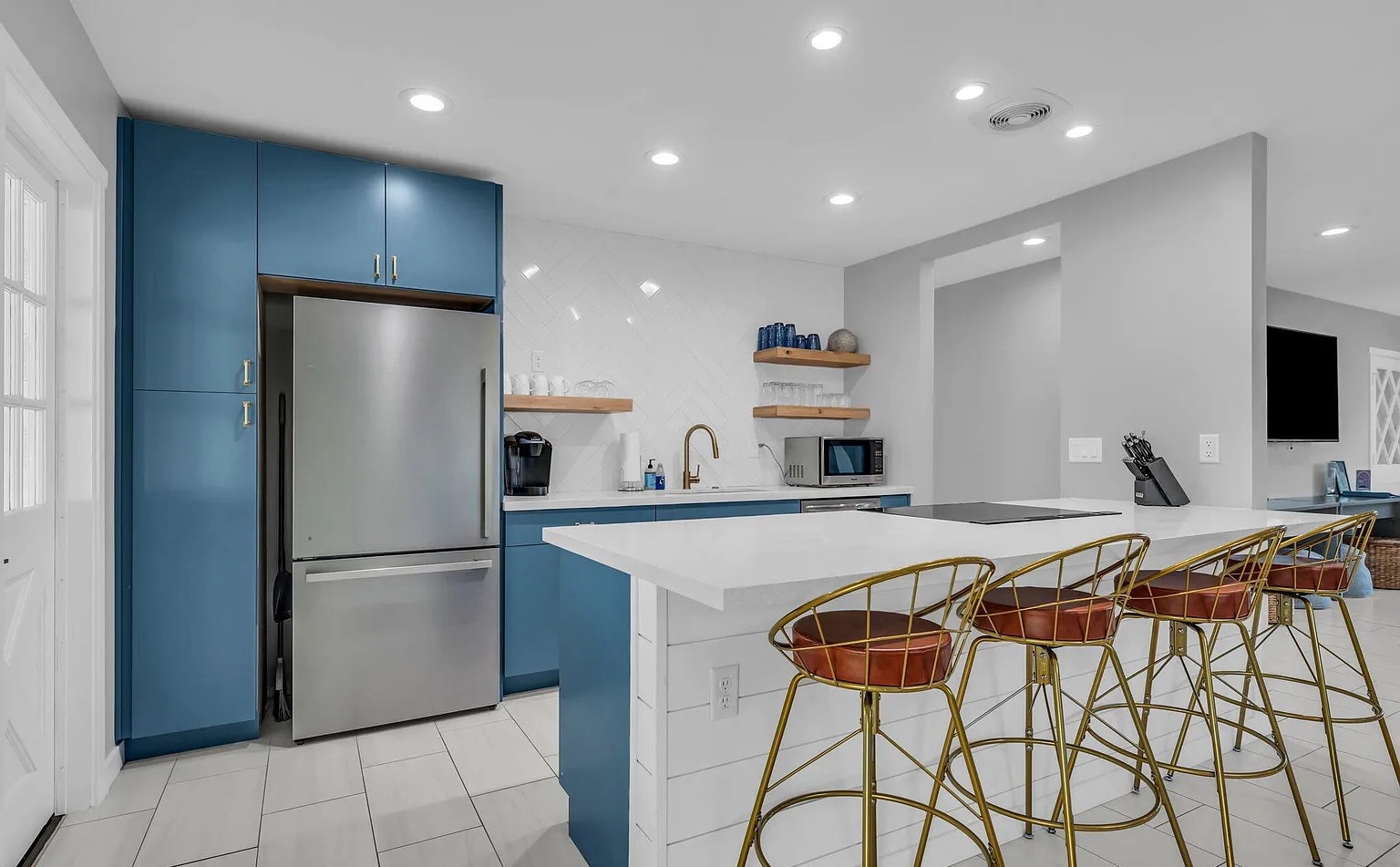 Newly remodeled kitchen with custom finishes.