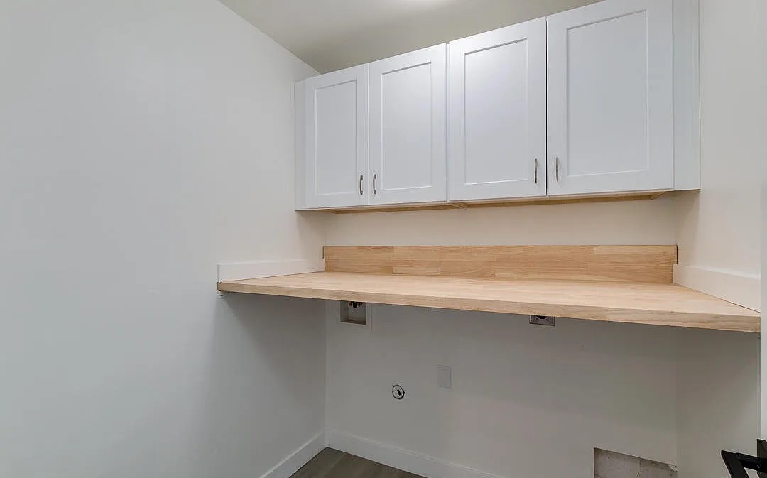Updated laundry room of Phoenix home remodel by Erwin Jaye Luxury Homes.