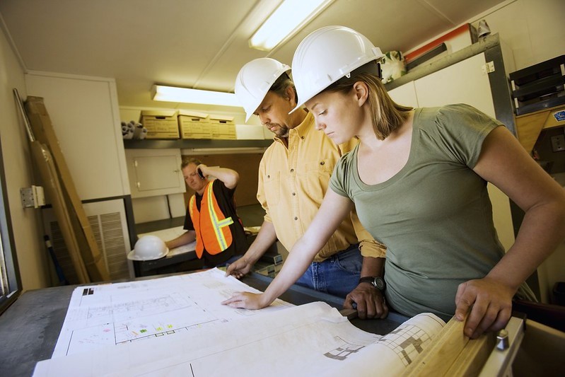 Architects and engineers planning a new home build.